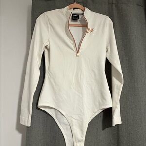 Nike Women's white and rose gold zip Long Sleeve Top